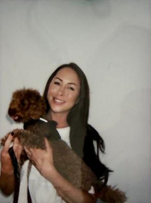 Charlotte holding her dog, Fendi
