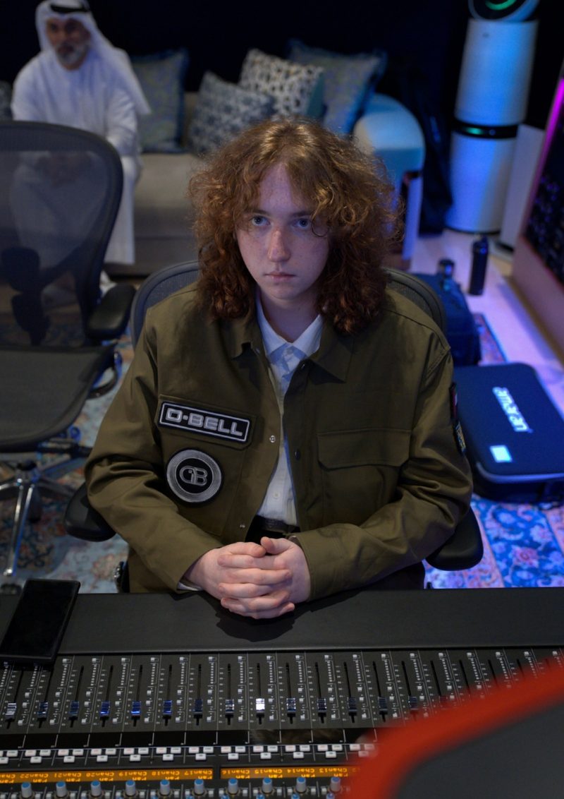 D-BELL at a mixing console in a recording studio