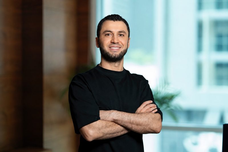 Fateh Al Msaddi, founder of DXBinteract, standing with arms crossed