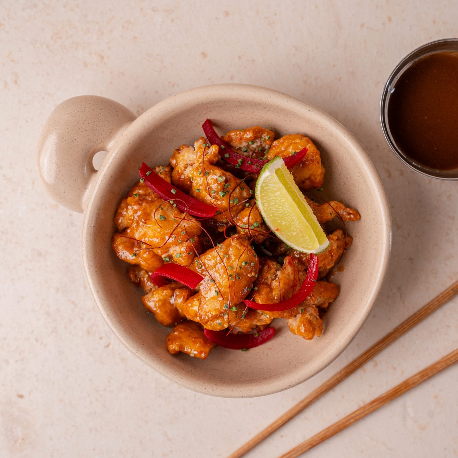 A bowl of glazed fried chicken with lime and red chilli, from SLRP’s new October dishes