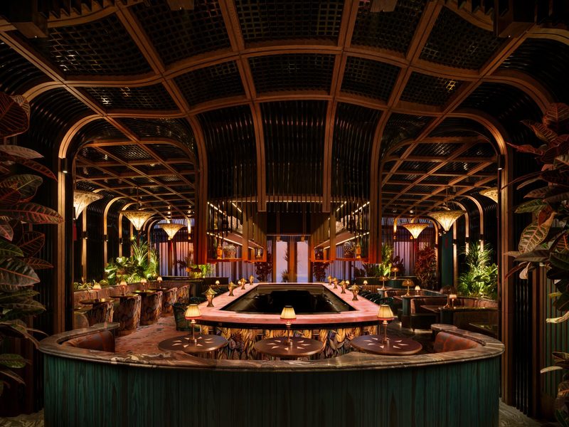 Curved bar under the arched wooden ceiling at TATTU Dubai