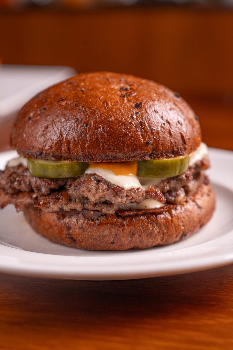 Izu Burger’s Protein Maxxer with double Angus beef patties on a wholegrain bun